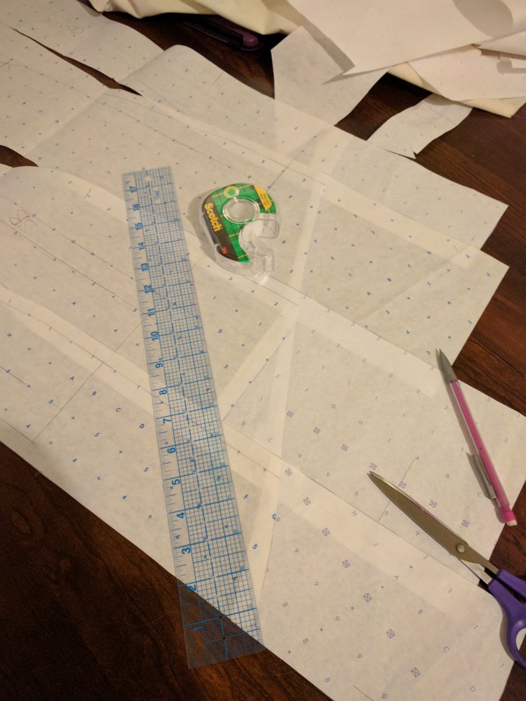 Tape the patterns on the seam lines, not the cut edges.